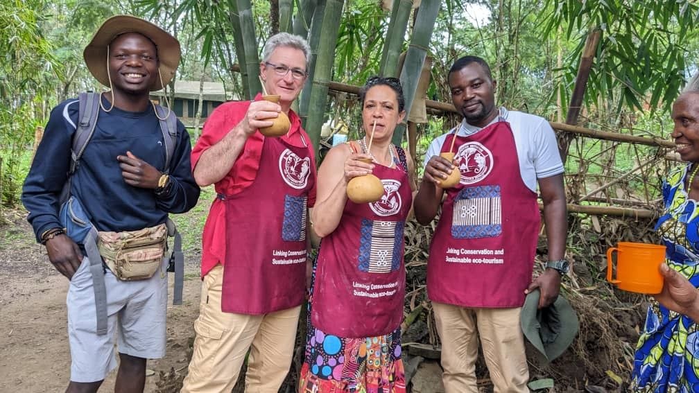 Travelers participating in a Rwanda community conservation and cultural activity