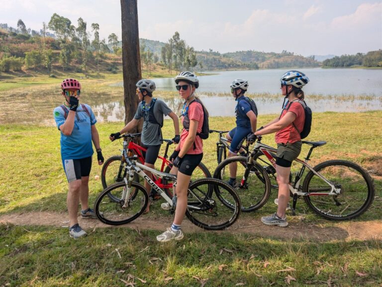Cyclists beside the Twin Lakes in northern Rwanda