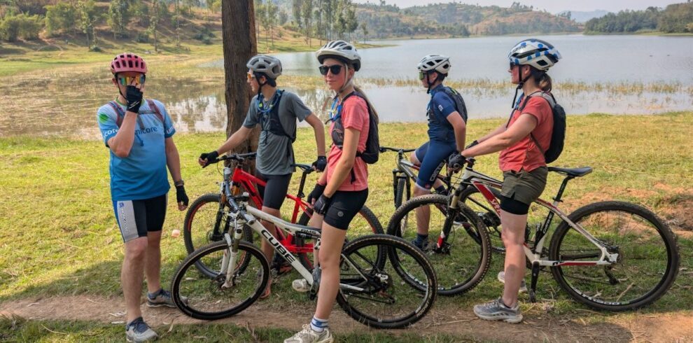 Cyclists beside the Twin Lakes in northern Rwanda